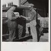 Henry Harringer, in charge of purchasing and marketing enterprise, buying oil and supplies. Two Rivers Non-Stock Cooperative Company, FSA (Farm Security Administration) co-op. Waterloo, Nebraska.
