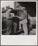 Henry Harringer, in charge of purchasing and marketing enterprise, buying oil and supplies. Two Rivers Non-Stock Cooperative Company, FSA (Farm Security Administration) co-op. Waterloo, Nebraska.