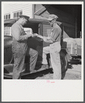 Henry Harringer, in charge of purchasing and marketing enterprise, buying oil and supplies. Two Rivers Non-Stock Cooperative Company, FSA (Farm Security Administration) co-op. Waterloo, Nebraska.
