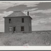 Abandoned farmhouse in the dry land area of the Sandhills northeast of Scottsbluff, Nebraska (See general caption number).