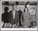 Farmer and wife at the Tri-County Farmers Co-op Market at Du Bois, Pennsylvania.