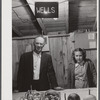 Mr. Wells, members of board of Directors of Tri-County Farmers Co-op Market at Du Bois, Pennsylvania, and his daughter at the market.