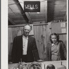 Mr. Wells, members of board of Directors of Tri-County Farmers Co-op Market at Du Bois, Pennsylvania, and his daughter at the market.
