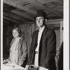 Farmer and his wife at their booth in the Tri-County Farmers Co-op Market at Du Bois, Pennsylvania.