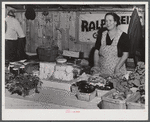 Mrs. Ralph Reitz by her booth at the Tri-County Farmers Co-op market at Du Bois, Pennsylvania.