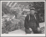 Mr. John Yenser on High Street with view of Mauch Chunk, Pennsylvania.