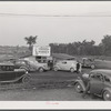 Customers' cars parked in front of Tri-County Farmers Co-op Market in Du Bois, Pennsylvania.