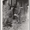 Miners at Dougherty's mine, near Falls Creek, Pennsylvania, sharpening their axes at the end of a day's work.