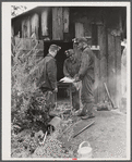 Miners at Dougherty's mine, near Falls Creek, Pennsylvania, sharpening their axes at the end of a day's work.
