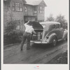 Mr. Ralph Reitz loading produce at his farm near Falls Creek, Pennsylvania for sale at the Tri-County Farmers Co-op Market in Du Bois, Pennsylvania, of which he is a member.
