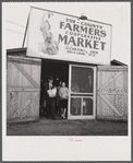 Customers at the entrance of the Tri-County Farmers Co-op Market in Du Bois, Pennsylvania.
