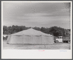 Traveling carnival at Old Trap, North Carolina. This troupe follows the migrants around and stops where there is a large settlement of them. A show generally consists of a band concert and movie and vaudeville.