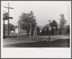 Barbed wire-enclosed barracks for migratory labors at Webster Canning Company, Cheriton, Virginia.