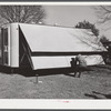 Palace mobile home. Expansion trailer for emergency defense housing demonstrated in Washington tourist camp. Washington, D.C..