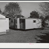 Palace mobile home. Expansion trailer for emergency defense housing demonstrated in Washington tourist camp. Washington, D.C..