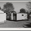 Palace mobile home. Expansion trailer for emergency defense housing demonstrated in Washington tourist camp. Washington, D.C..