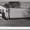 Palace mobile home. Expansion trailer for emergency defense housing demonstrated in Washington tourist camp. Washington, D.C..
