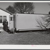 Palace mobile home. Expansion trailer for emergency defense housing demonstrated in Washington tourist camp. Washington, D.C..