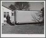 Palace mobile home. Expansion trailer for emergency defense housing demonstrated in Washington tourist camp. Washington, D.C..