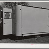 Palace mobile home. Expansion trailer for emergency defense housing demonstrated in Washington tourist camp. Washington, D.C..