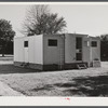 Palace mobile home. Expansion trailer for emergency defense housing demonstrated in Washington tourist camp. Washington, D.C..