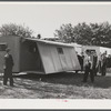 Palace mobile home. Expansion trailer for emergency defense housing demonstrated in Washington tourist camp. Washington, D.C..