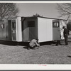 Palace mobile home. Expansion trailer for emergency defense housing demonstrated in Washington tourist camp. Washington, D.C..