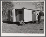 Palace mobile home. Expansion trailer for emergency defense housing demonstrated in Washington tourist camp. Washington, D.C..