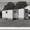 Palace mobile home. Expansion trailer for emergency defense housing demonstrated in Washington tourist camp. Washington, D.C..