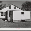 Palace mobile home. Expansion trailer for emergency defense housing demonstrated in Washington tourist camp. Washington, D.C..