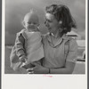 Mrs. B.M. Henderson, wife of defense worker, and daughter, who live in Sunset Village. FSA (Farm Security Administration) project. Radford, Virginia.