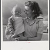 Mrs. B.M. Henderson, wife of defense worker, and daughter, who live in Sunset Village. FSA (Farm Security Administration) project. Radford, Virginia.