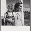 Mrs. Howard H. Smith and daughter from Galax by rural home built by FSA (Farm Security Administration) for defense workers near Radford, Virginia.