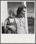 Mrs. Howard H. Smith and daughter from Galax by rural home built by FSA (Farm Security Administration) for defense workers near Radford, Virginia.