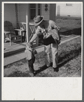 Radford, Virginia. Fred B. Williams from Savannah, Georgia, a safety engineer at the power plant, leaving his home to go to work. Sunset Village, a FSA (Farm Security Administration) project for defense workers.