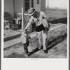 Radford, Virginia. Fred B. Williams from Savannah, Georgia, a safety engineer at the power plant, leaving his home to go to work. Sunset Village, a FSA (Farm Security Administration) project for defense workers.
