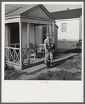 Fred B. Williams from Savannah, Georgia, a safety engineer at the powder plant, leaving his home at 803 9th Street. Sunset Village, Radford, Virginia. FSA (Farm Security Administration) project for defense workers.