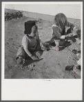 Children of defense workers playing outside their home in Sunset Village. FSA (Farm Security Administration) housing project. Radford, Virginia.