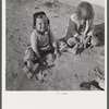 Children of defense workers playing outside of their homes in Sunset Village. FSA (Farm Security Administration) housing project. Radford, Virginia.