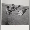 Children of defense workers playing outside their homes in Sunset Village. Radford, Virginia. FSA (Farm Security Administration) project.