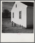 Children of defense workers playing outside their home in Sunset Village, FSA (Farm Security Administration) housing project. Radford, Virginia.
