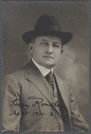 Portrait photograph of magician Harry Rouclere