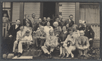 Magicians and family on the steps of the Hotel Rouclere