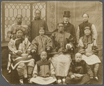 Publicity photograph of Ching Ling Foo, his family, his assistants, and agent and manager Leon Mooser