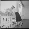 Unidentified woman on hotel balcony