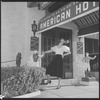 Unidentified woman outside hotel