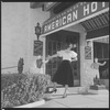 Unidentified woman outside hotel