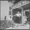 Unidentified woman outside hotel