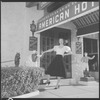 Unidentified woman outside hotel