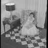 Unidentified woman in armchair